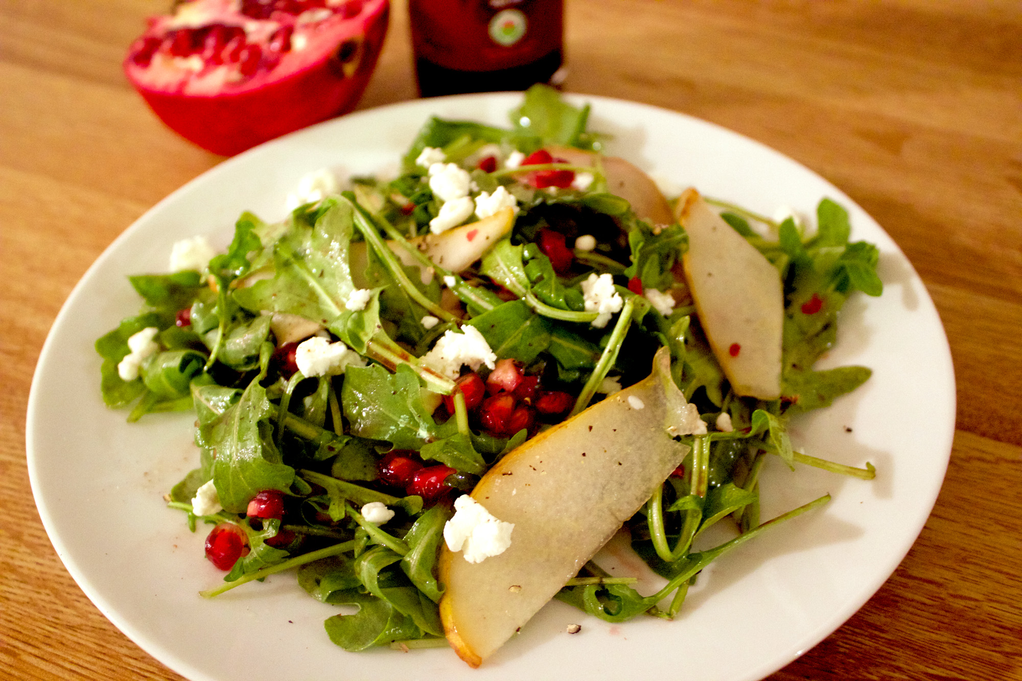 Pear and Rocket Salad with Pomegranate Dressing and Goat Cheese
